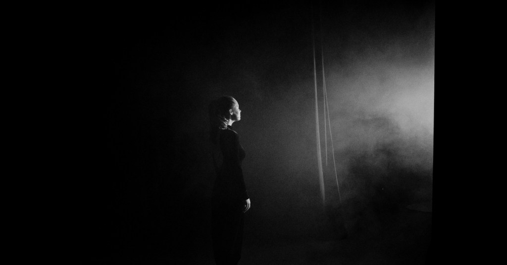 A woman left alone in the dark due to her narcissistic husband's activity.