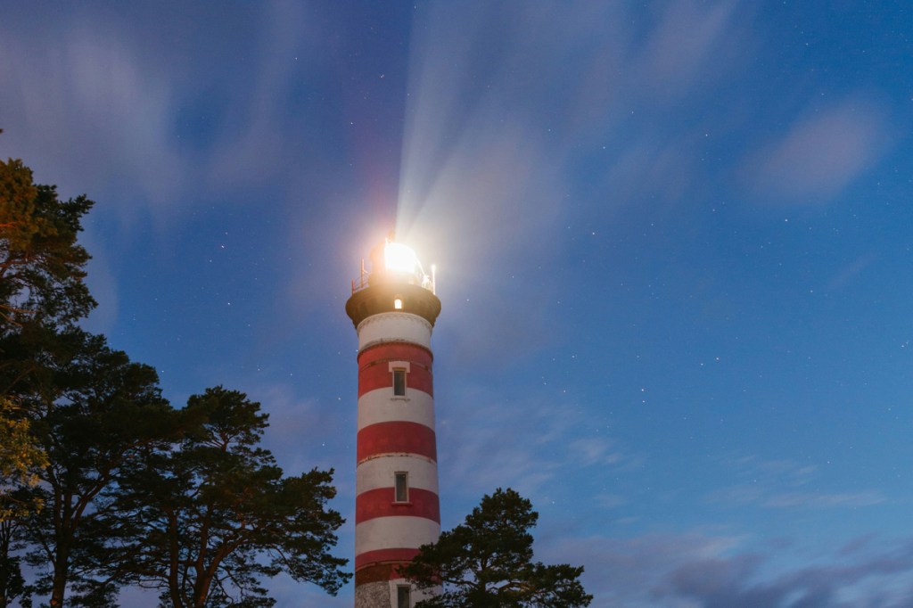 A lighthouse shining in the sky, representing seeing the warning signs of cheating, secrecy and compulsive behavior found in a narcissist.